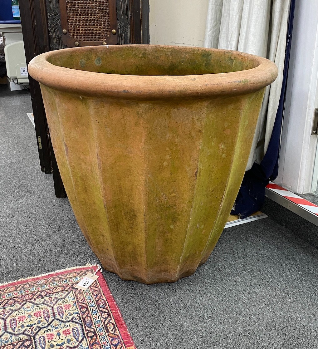 A large terracotta garden pot, diameter 66cm height 63cm